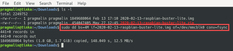 Terminal screenshot explaining how to write the Raspbian image to the SD-card with dd