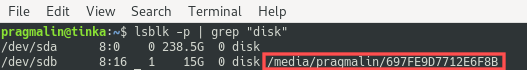 Terminal screenshot with the lsblk command output. It highlights how you can determine if a disk is currently mounted. In this case the mount point directory is listed at the end