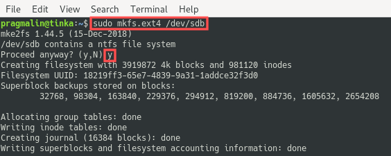 Terminal screenshot that shows the output of running the mkfs.ext4 command for formatting the USB drive with the EXT4 file system format