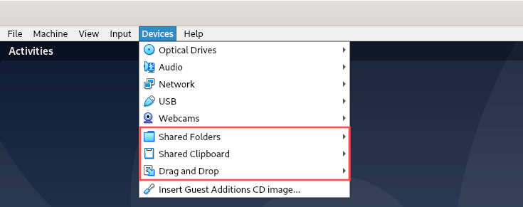 Virtual machine screenshot that highlights the options in the VirtualBox menu related to features that are now available after installing the guest additions.