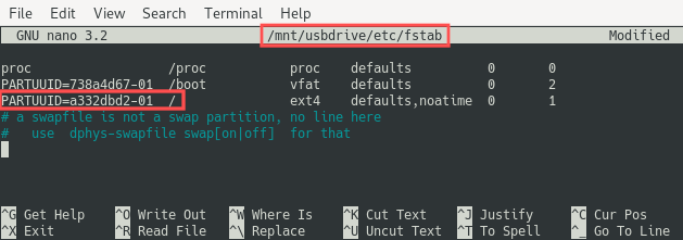 Screenshot of editing the Raspberry PI's /etc/fstab file with nano. It shows where to change the PARTUUID of the root file system. It should be set to the PARTUUID of the partition on the USB drive.