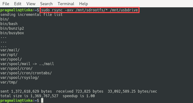 Terminal screenshot that shows how all the files of the Raspberry PI root file system are copied to the partition on the USB drive.