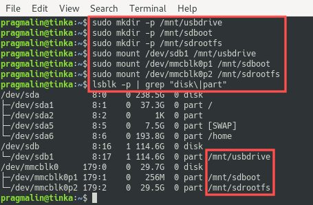 Screenshot that shows how the USB drive and SD card partitions got mounted on a Linux PC.