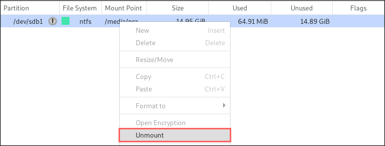 Partial GParted screenshot that show you how to unmount the partitions of your USB drive, which is needed before you can format it.