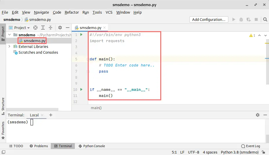 PyCharm IDE screenshot. It shows how to create a new file called smsdemo.py and how to enter the program's framework code. It will be used as a test program starting point to send an SMS message from Python.