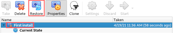 VirtualBox screenshot that illustrates how you would restore a virtual machine to a previously created snapshot.