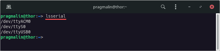 Terminal screenshot showing the output of the newly added "lsserial" Bash alias for listing all serial port devices on Linux.